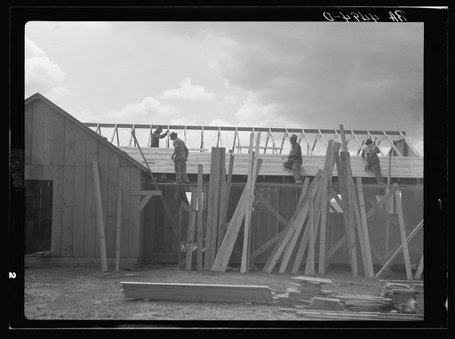 Carpenters at work on barracks for Resettlement Administration construction camp. Oneida County, Idaho