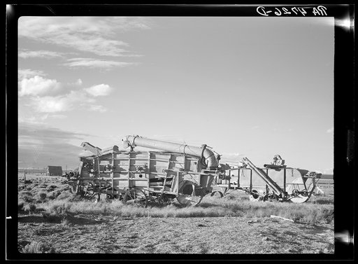 Rusting and battered combines of more prosperous days show how vain efforts are to grow wheat in the dry central Oregon area