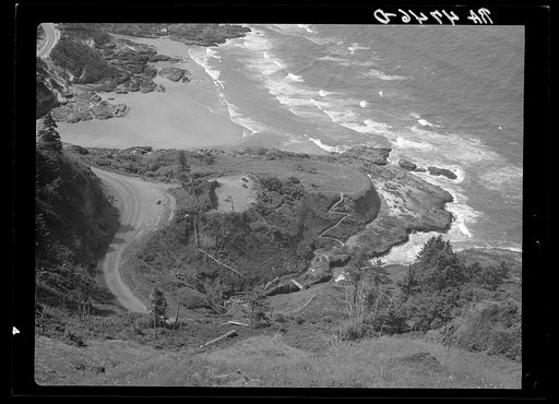 The Devil's Cauldron and the Oregon coast highway, features of the Resettlement Administration's recreation area which attract many tourists. Oregon