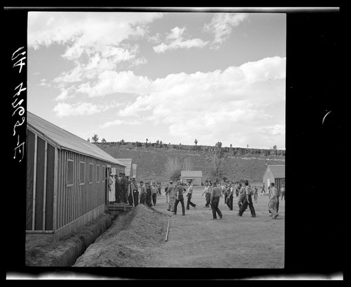 After a hard day's work these Resettlement Administration workers welcome the sound of the dinner gong. Rimrock Camp, Madras, Oregon