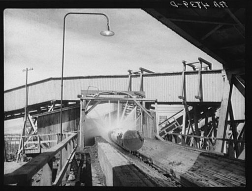 Washing logs before sawing. Longview, Washington