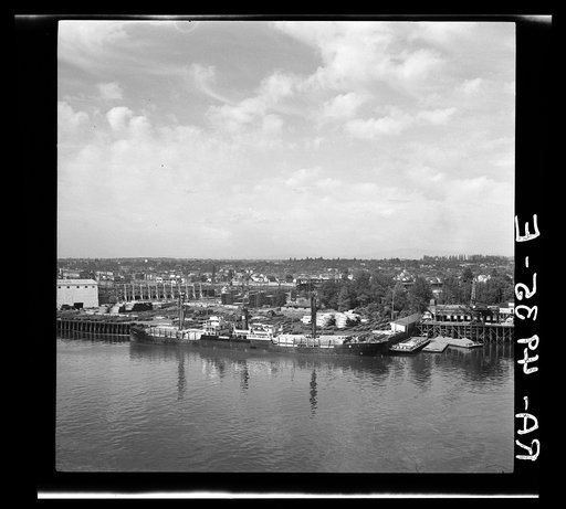 Loading lumber. Willamette River. Portland, Oregon