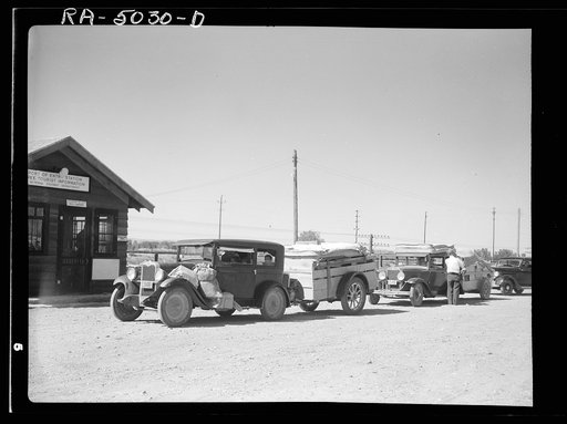 Everyday from twenty to thirty cars moving out from the Dakotas pass the Montana Highway Department's port of entry. Montana