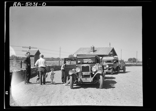 Part of the daily motorcade of drought refugees. The Montana-North Dakota state line