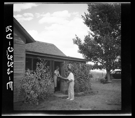 Doctor Tugwell visiting rehabilitation client's home. South Dakota