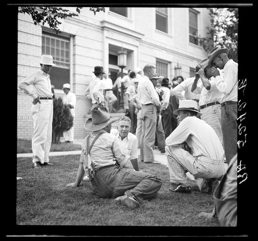 Dr. Tugwell talks with farmers at Springfield, Colorado