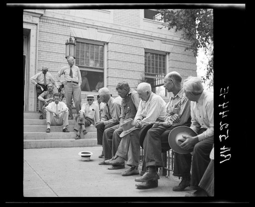 Farmers of Springfield, Colorado, listen attentively to H.H. Bennett of drought committee