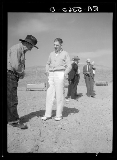 Dr. Tugwell talks to worker on resettlement project. Campbell County, Wyoming