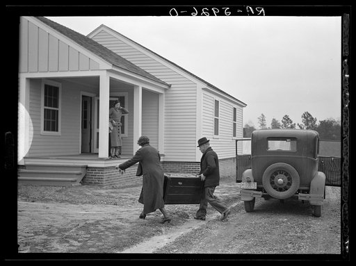 The Howard family moving into their new home at Gardendale, Alabama