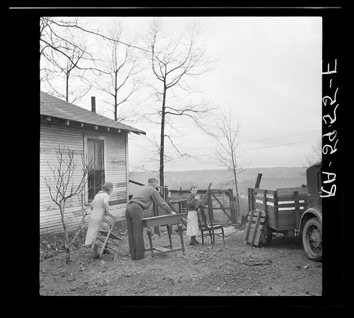 The Eargle Family moving their household goods out of their home at Fairfield, Alabama. They will become homesteaders at Gardendale, Alabama