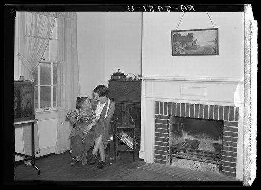 Mrs. L.C. Glenn and son in their new home at Greenwood, Alabama