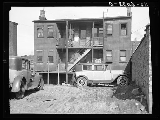 Rear of apartment house between Juneau and McKinley Streets. Milwaukee, Wisconsin