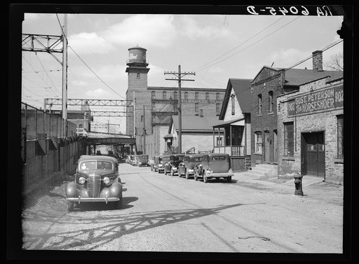 Group of houses at Detroit and Van Buren Streets, near electric railroad. Milwaukee, Wisconsin
