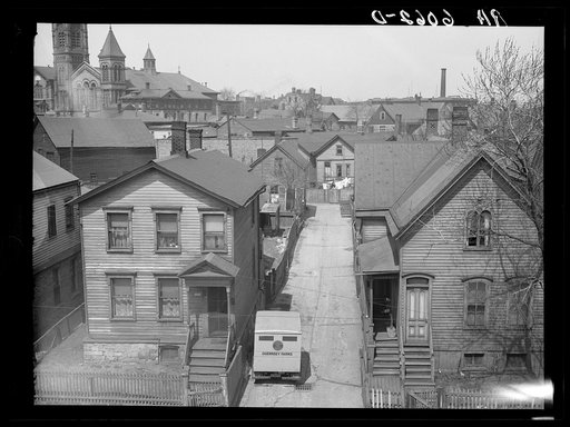 Alley and houses at 1012 West Somers Street. Milwaukee, Wisconsin