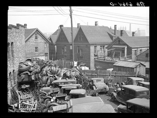Junk, with living quarters close by. Milwaukee, Wisconsin