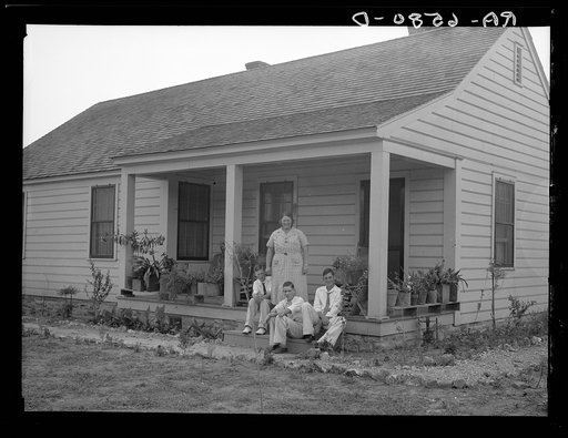 Five-room house and family at the Palmerdale Homesteads near Birmingham, Alabama