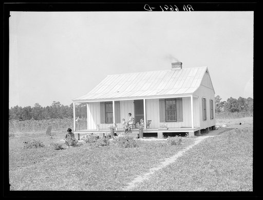 Family resettled in house on Irwinville Farms, Georgia