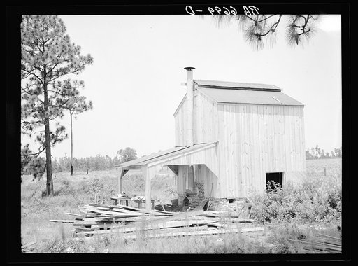 Flue cure tobacco barn on Irwinville Farms, Rural Resettlement Administration project at Irwinville, Georgia