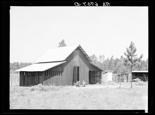 "Bryan" barn on rural resettlement farm unit in Irwinville Farms, Georgia.  This barn, designed and built under supervision of W.P. Bryan, project manager, cost one hundred forty-five dollars. This compared with the cost of three hundred fifty dollars of Rural Resettlement Administration-specified b