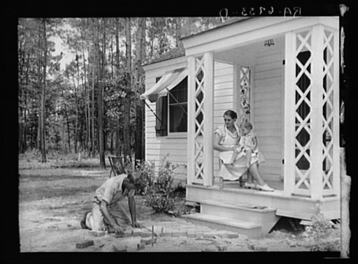 Homesteader laying brick walk. Penderlea Homesteads, North Carolina