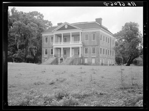 The Drayton Hall, the last of eighteeen similar Georgian homes which were burned after the War of the States by Union. Near Sumerville, South Carolina. This house was saved because it housed patriots ill with smallpox and the troops dared not enter the grounds for fear of their own health. It was bu