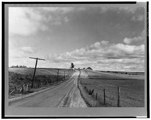 Many Vermont farms lie close to the highways. This one is near Westfield, Vermont
