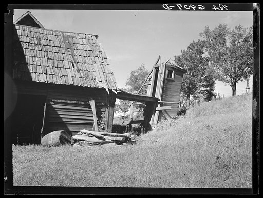 Old farmhouse and privy. Lowell, Vermont