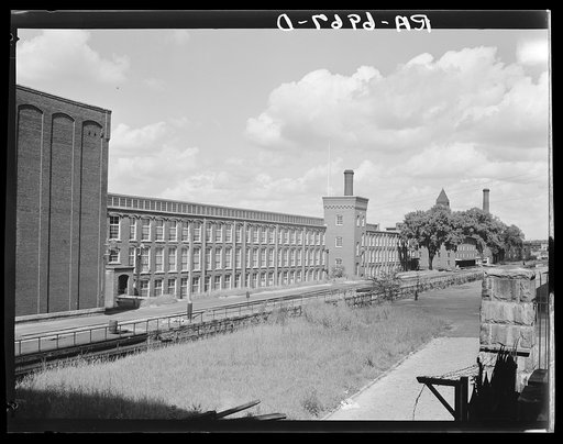Amoskeag mills looking north from Bridge Street on Canal Street side. Manchester, New Hampshire