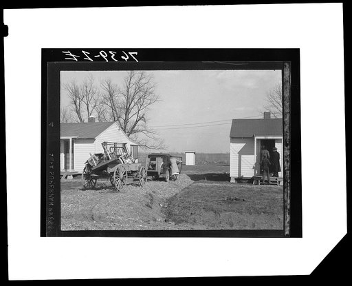 Wicker family preparing to unload household furniture. Southeast Missouri