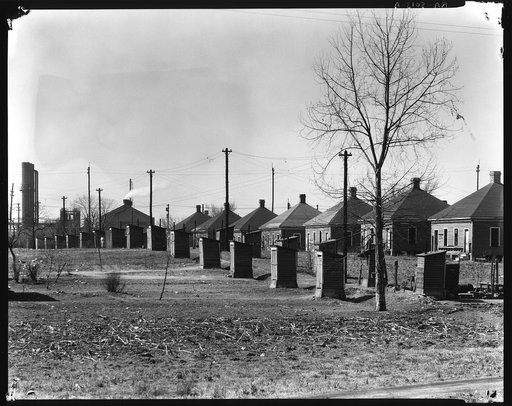 Steelmill workers' company houses and outhouses. Republic Steel Company, Birmingham, Alabama