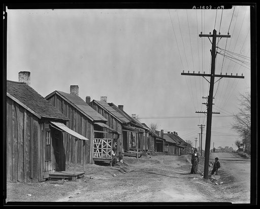 Street in Negro quarter. Tupelo, Mississippi