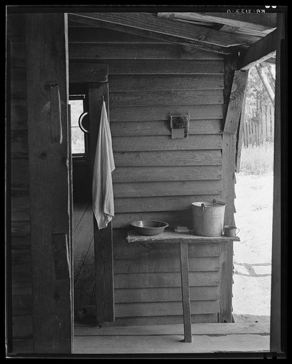 Washstand in the dog run of Floyd Burroughs' cabin. Hale County, Alabama