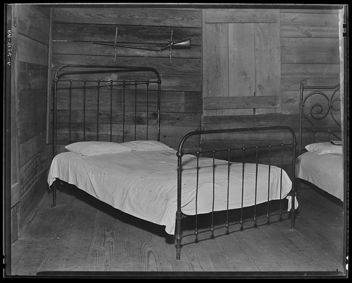 Part of the bedroom of Floyd Burroughs' cabin. Hale County, Alabama