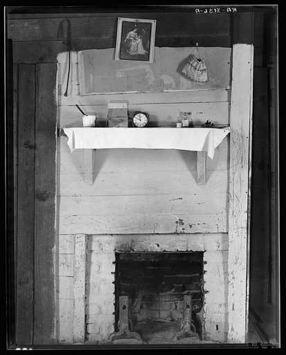 Fireplace in bedroom of Floyd Burroughs' cabin. Hale County, Alabama
