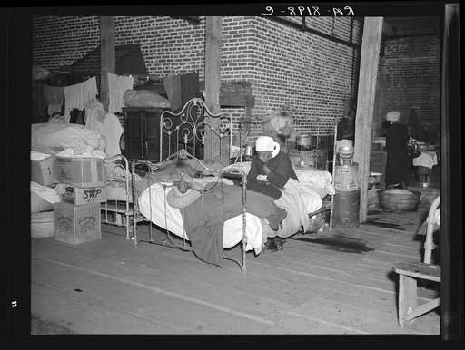 Sick flood refugee in the Red Cross temporary infirmary at Forrest City, Arkansas