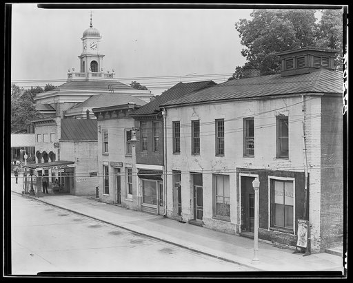 Greensboro, Alabama. Main street buildings and county courthouse cupola