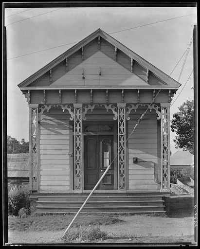 Frame building with jigsaw ornament. Southeastern United States