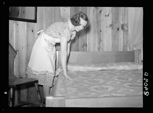 Mrs. Pope making special skills bed. Irwinville Farms, Georgia