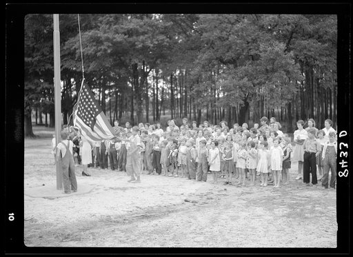 Raising the flag at the Irwinville School. Irwinville Farms, Georgia