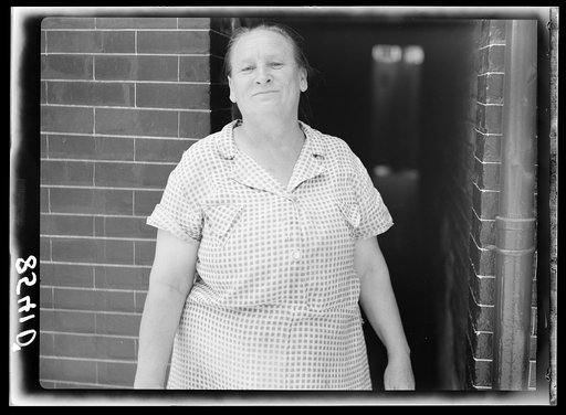 Woman who lives in row house. Baltimore, Maryland