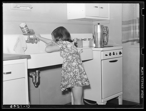Child in kitchen of Greenhills, Ohio, home