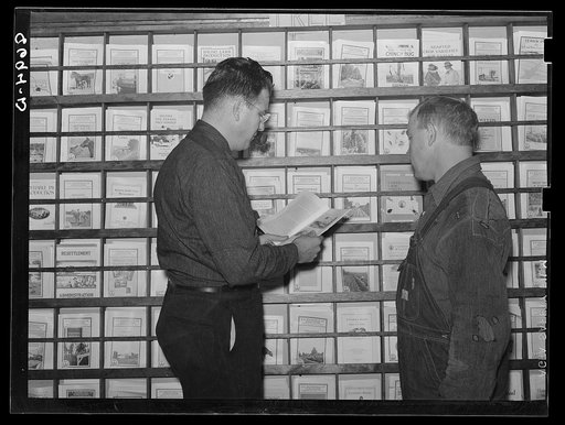 County supervisor and rehabilitation client in the Farm Security Administration office. Yates Center, Kansas
