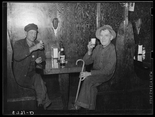 Farmer and ex-cowboy drinking beer in North Platte, Nebraska, saloon