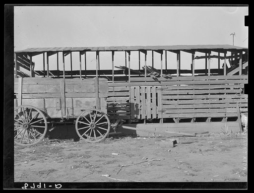 Corn crib and wagon. Kansas
