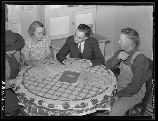 County supervisor working on farm plan with rehabilitation clients. Otoe County, Nebraska