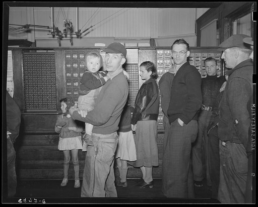 Miners waiting in post office for mail. Kempton, West Virginia