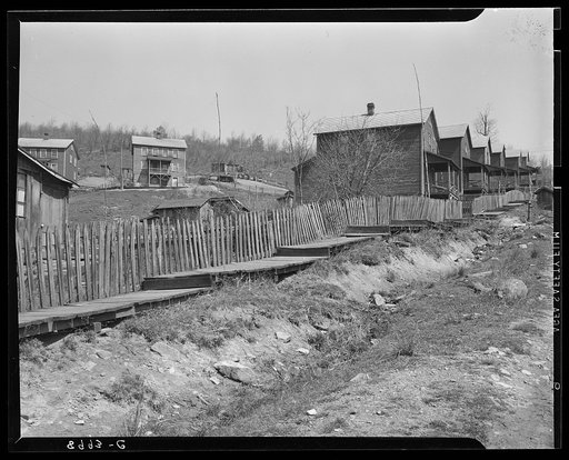 Street in company coal town. Kempton, West Virginia. Open ditches carry sewage down the street