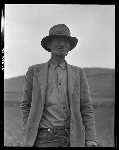 This man is a labor contractor in the pea fields of California. "One-Eye" Charlie gives his views. "I'm making my living off of these people (migrant laborers) so I know the conditions." San Luis Obispo County, California