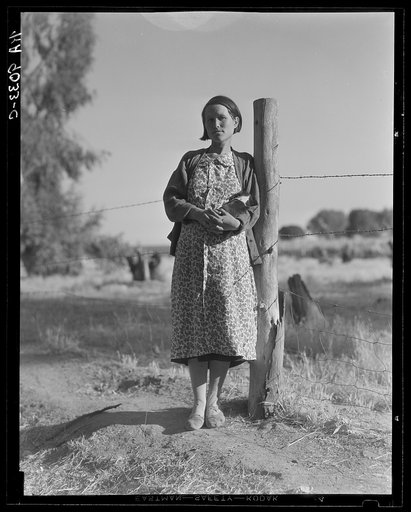 Pregnant migrant woman living in California squatter camp. Kern County
