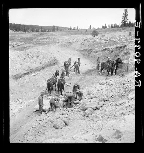 Widtsoe land use adjustment project. Garfield County, Utah. Excavating new spillway of Tropic Dam